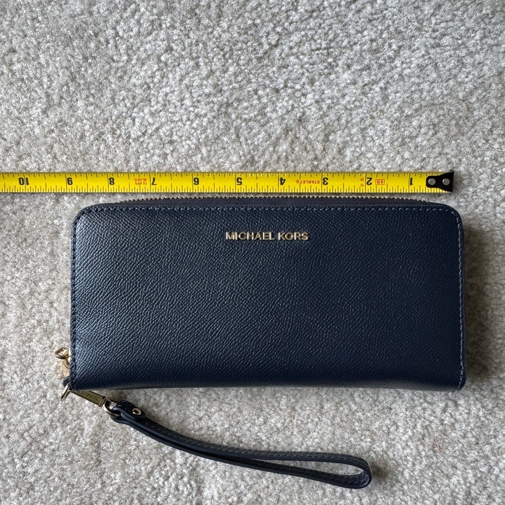 Jet Set Travel Large Pebbled Leather Wristlet